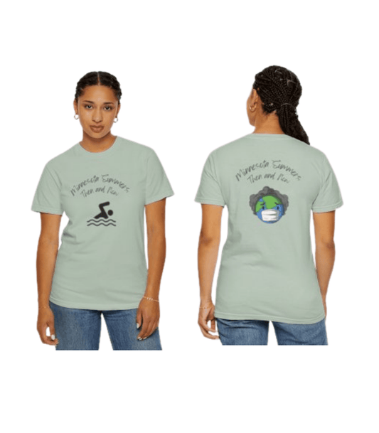 Person wearing a light green t-shirt with graphics and text on a white background